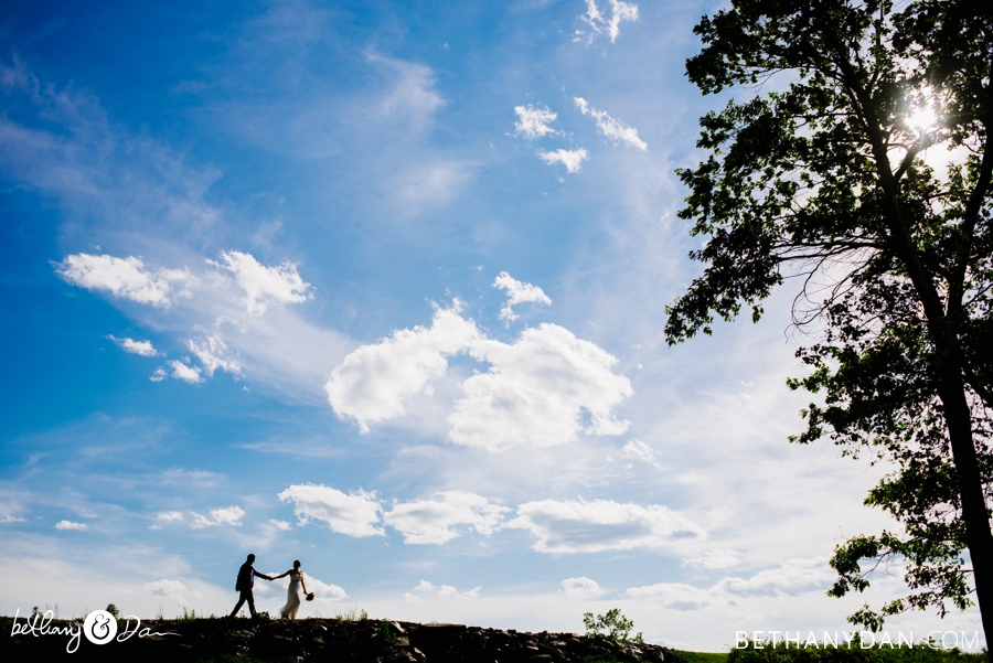 The bride and groom against the sky