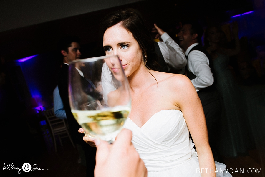 The bride and a wine glass reflection