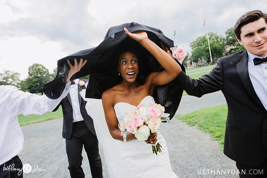 The bride getting out of the rain