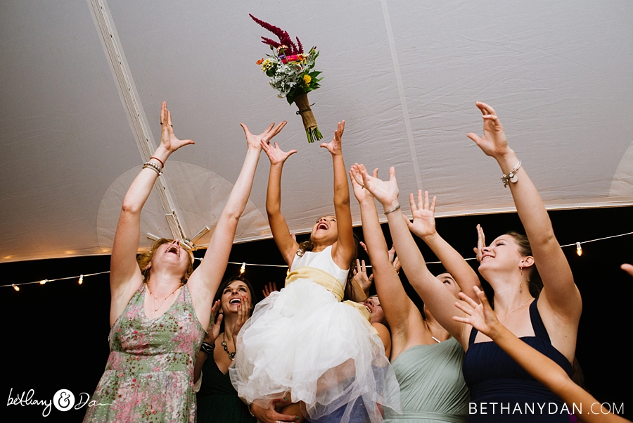 All the girls trying to catch the boquet
