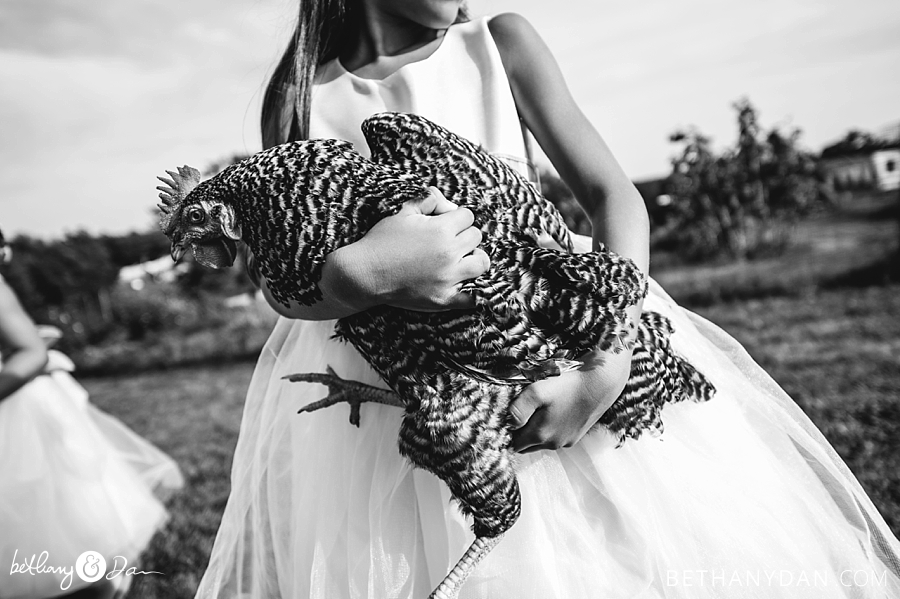 A flower girl and a chicken