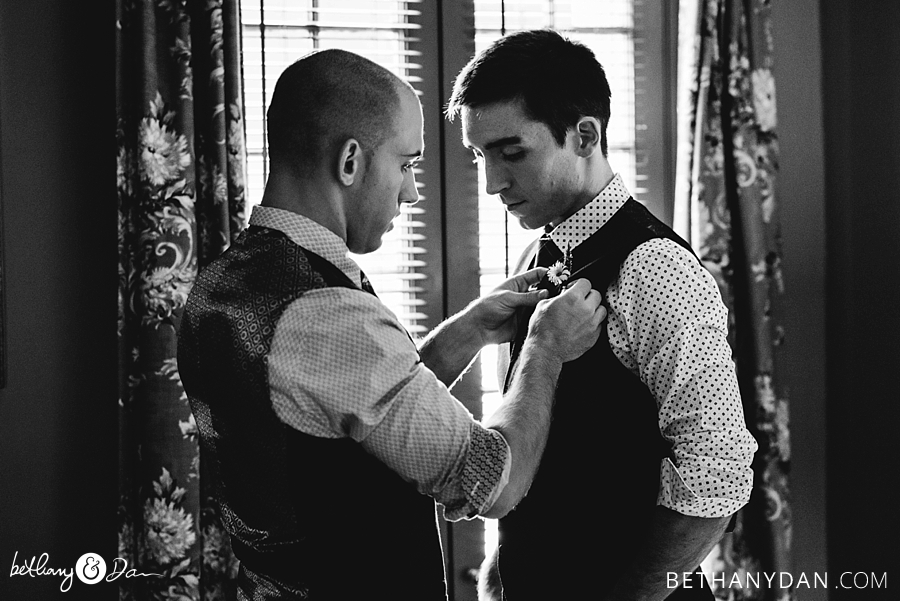 the two grooms get ready