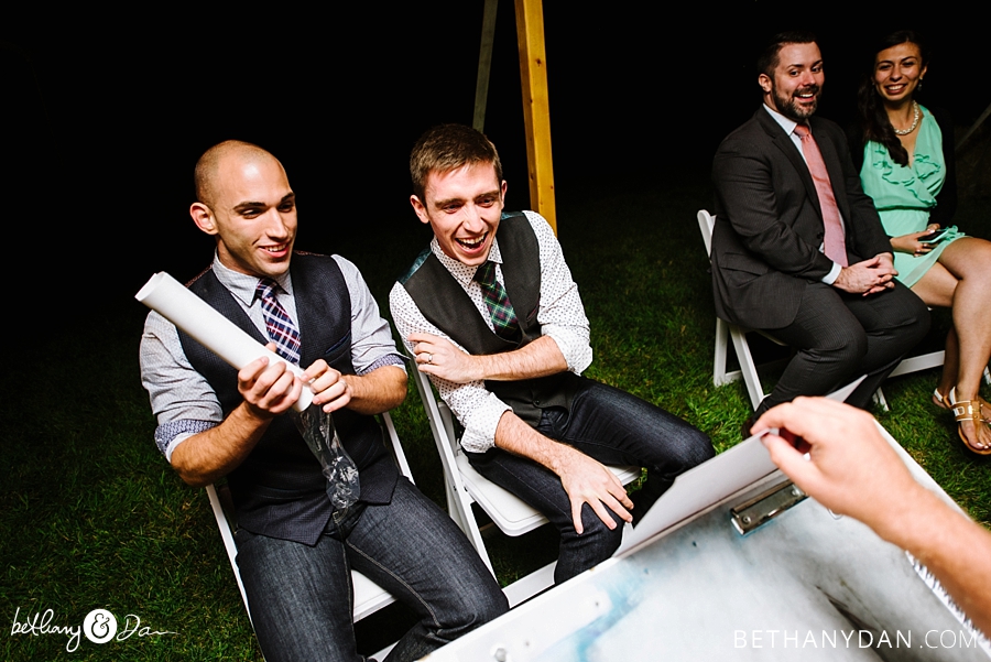 The grooms laughing 