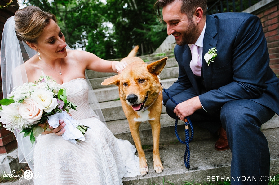 The bride and groom with their dog
